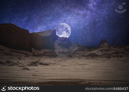 Valle de la Luna (Moon Valley) close to San Pedro de Atacama, Chile. starry sky shines at night.. Valle de la Luna (Moon Valley)