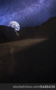 Valle de la Luna (Moon Valley) close to San Pedro de Atacama, Chile. starry sky shines at night.. Valle de la Luna (Moon Valley)