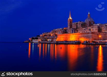Valletta. Mediterranean harbor at night.. St. Paul&rsquo;s Cathedral in Valletta at sunset. Malta. Valletta