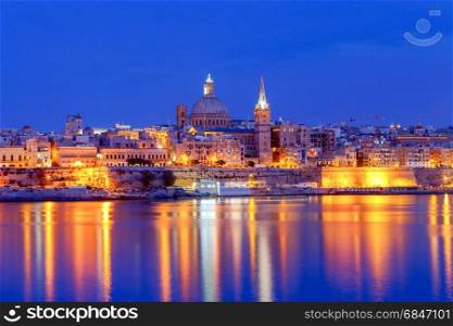 Valletta. Mediterranean harbor.. St. Paul&rsquo;s Cathedral in Valletta at sunset. Malta.