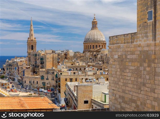 Valletta. The Basilica of Our Lady and the Tower of the Cathedral.. The Basilica of Our Lady of Mount Caramel in the historical part of Valletta. Malta.
