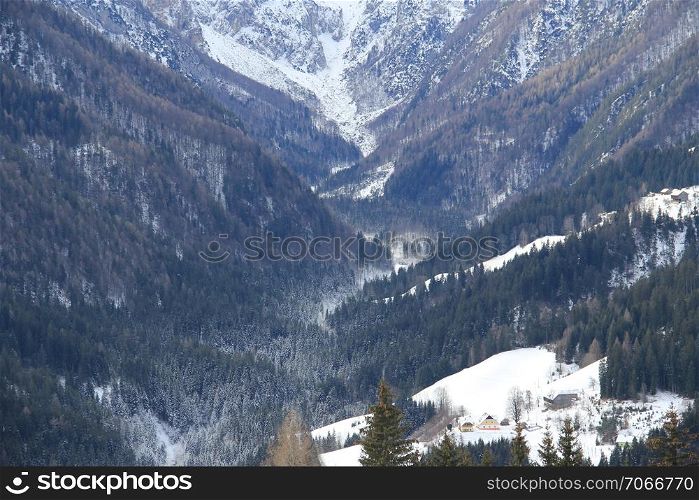 Valley and big mountains arround in the winter