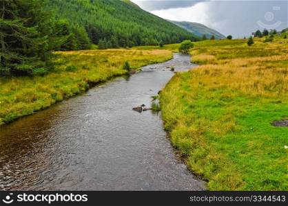 Valley and stream in the Highlands of Scotland
