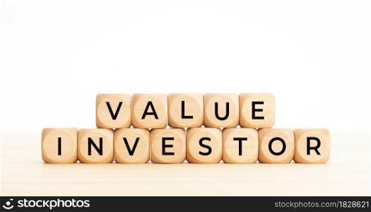 Value investor phrase on wooden block shape. Copy space. White background