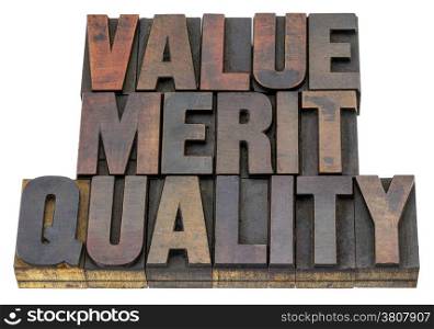 value, merit, quality - isolated word in vintage letterpress wood type with ink patina