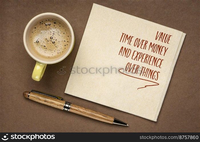 value time over money and experience over things - inspirational reminder or advice on a napkin with coffee, personal values and development concept