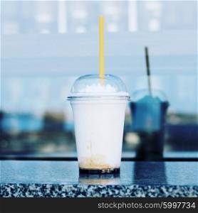 Vanilla frappe with plastic straw