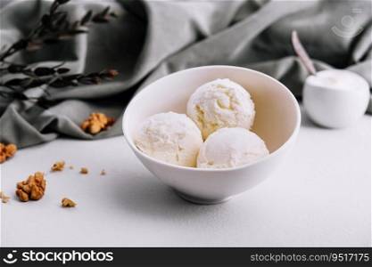 Vanilla ice cream balls with walnut