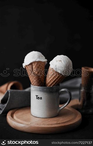 Vanilla Ice Cream in a waffle cones.. Vanilla Ice Cream.