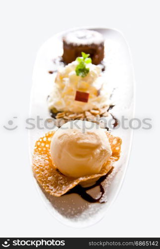 vanilla ice cream with chocolate cake on white background