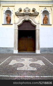 vanzaghello italy church varese the old door entrance and mosaic sunny daY rose window