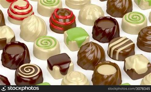 Variety of chocolate candies on white background