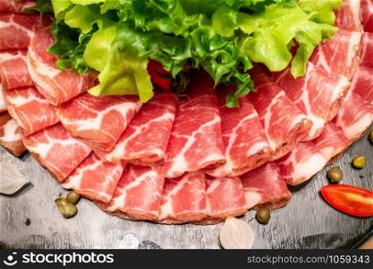 Variety of Cold cut, pork and beef salami, for salad station in buffet line