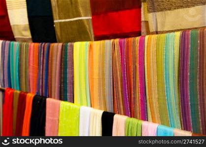 Variety of colorful scarves soled in Medina in Marrakech, Morocco