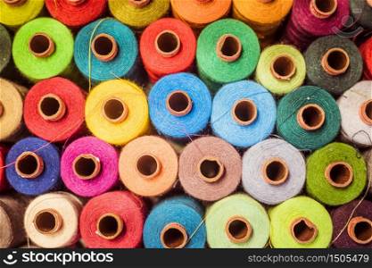 Variety of colorful sewing threads, birds eye