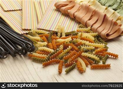 Variety of colorful traditional Italian pasta