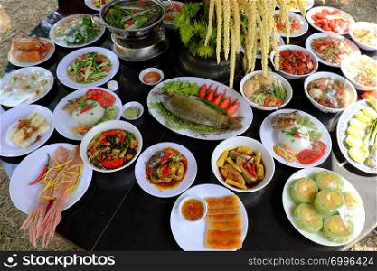 Variety of food on party table, group of Vietnamese food model imitation from Vietnam cuisine make by plastic, colorful of popular food with noodle, vegetables, soup, roll from high view