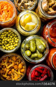 Variety of homemade pickled food. Top view. Variety of homemade pickled food.