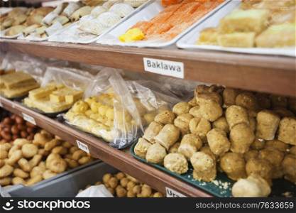 Variety of Indian sweet food displayed at store