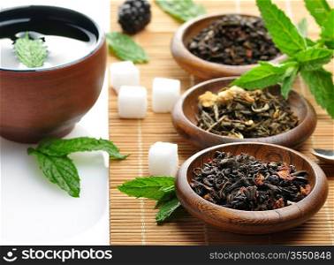 Variety Of Organic Tea And A Tea Cup