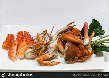 variety of Steam crab in white dish