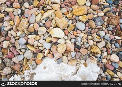 Variety of stones in a stone shore in the coast