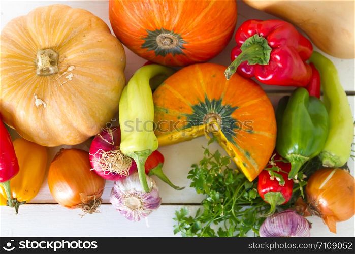 variety of vegetables on a rustic wooden background