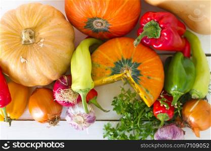 variety of vegetables on a rustic wooden background