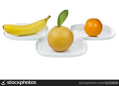Variety of whole fruit in each plate on white background