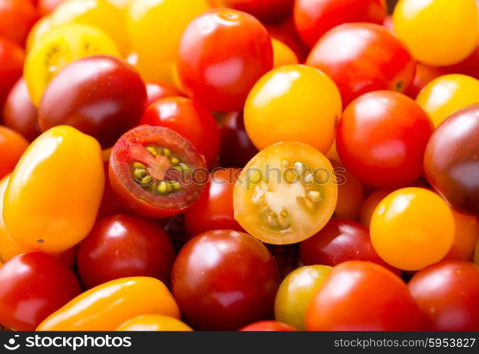 various cherry tomatoes as background