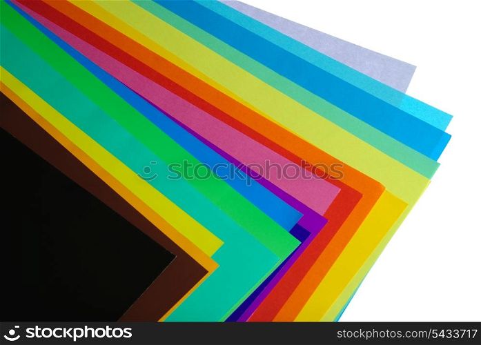 various color paper stack like a rainbow isolated on white
