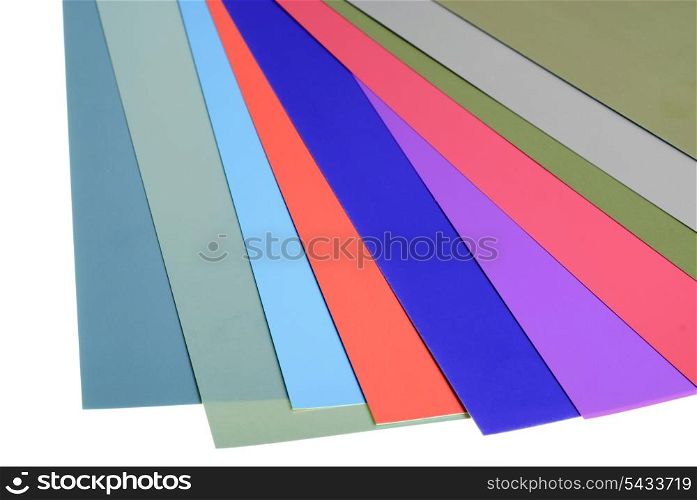 various color silk paper stack like a rainbow isolated on white