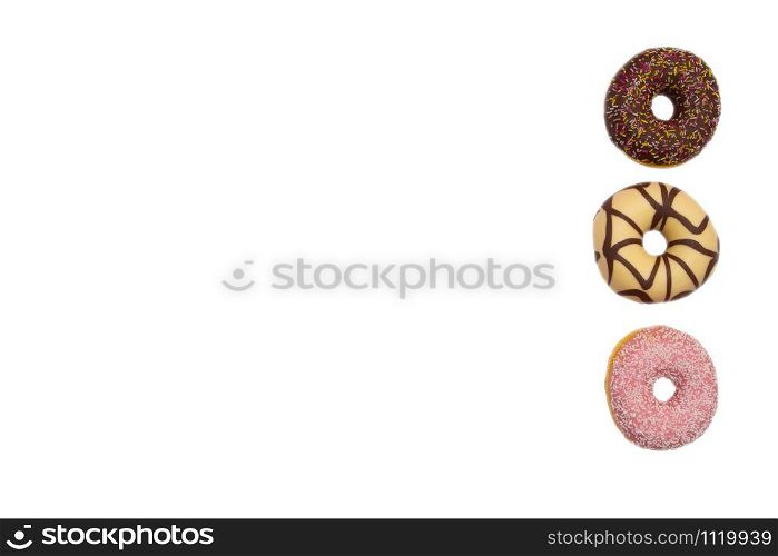 various colored delicious donuts on white background, space for text Fastfood. various colored delicious donuts on white background, space for text