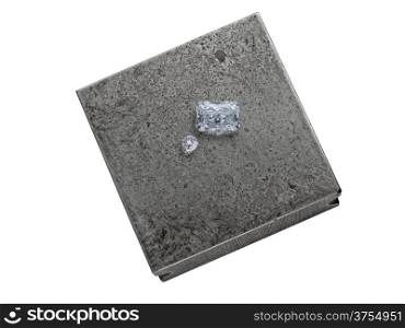 various cut cluster of diamonds on a working jeweler anvil, clipping path