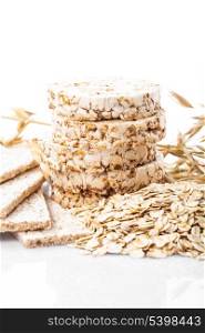 Various dietary oat products on white background