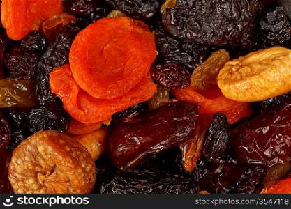 Various dried fruits (apricots, dates, raisins, figs) close-up