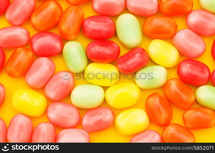 Various dry colourful sweets arranged as background