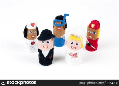 Various finger puppets showing different jobs on white background