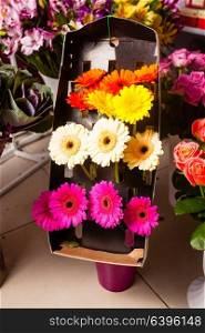 Various fresh flowers in the flower market. Bunches of flowers for sale