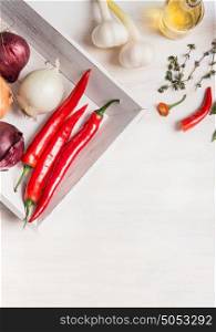 Various fresh spices and seasoning and condiment on white wooden background, top view. Healthy , clean food or vegetarian cooking and eating concept