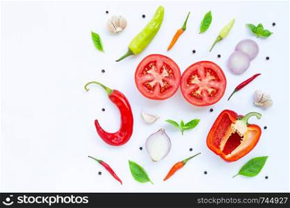 Various fresh vegetables and herbs on white background. Food and cooking ingredients, Healthy eating concept. Copy space