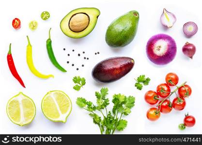 Various fresh vegetables and herbs on white background. Guacamole ingredients concept