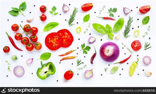 Various fresh vegetables and herbs on white background. Healthy eating concept.