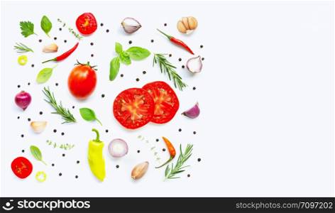 Various fresh vegetables and herbs on white background. Healthy eating concept. Copy space
