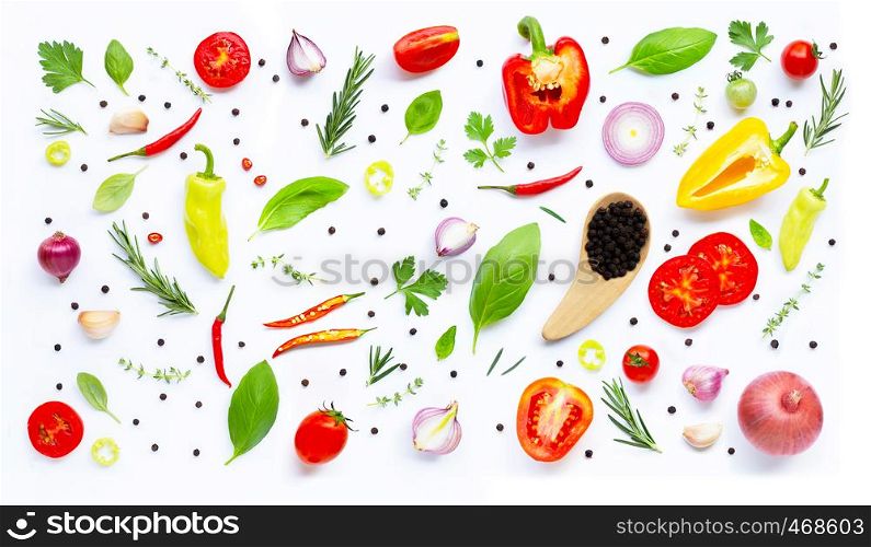 Various fresh vegetables and herbs on white. Healthy eating concept.