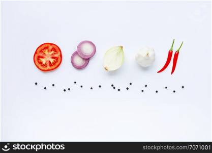 Various fresh vegetables and herbs on white. Healthy eating concept