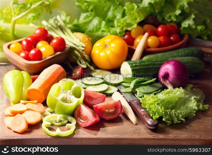 various fresh vegetables on cutting board