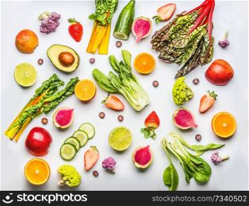 Various fruits, berries and vegetables on white background, top view. Food flat lay. Healthy lifestyle