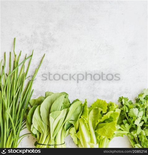 various green vegetables arranged row