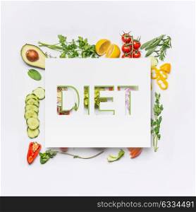 Various healthy salad vegetables ingredients and text diet on white desk background, top view. Clean eating layout, vegetarian food and diet nutrition concept.